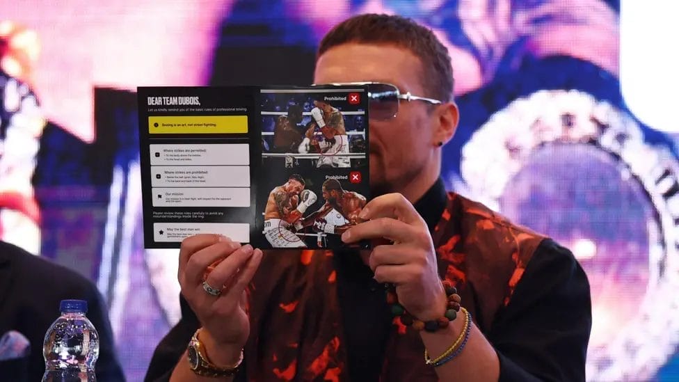 'Conman Usyk deserves an Oscar' - Team Dubois 2 Team Usyk also had a 'boxing lesson' leaflet prepared to Dubois and his team