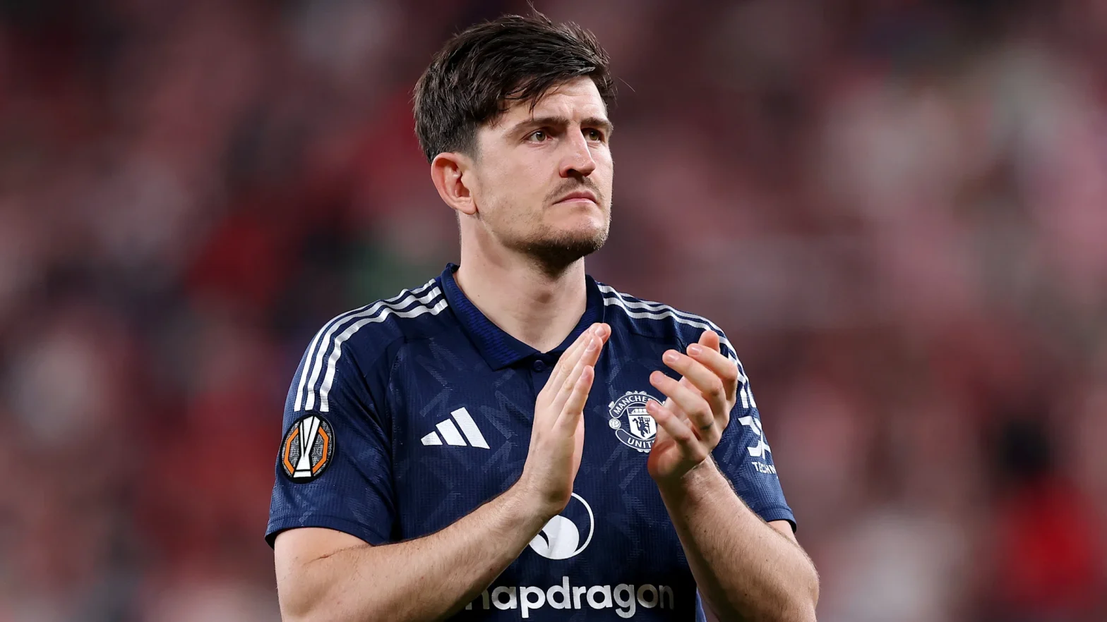 Ruben Amorim Hails Harry Maguire Turnaround After Man Utd Exit Snub Harry Maguire's Transformation Draws Praise from Ruben Amorim Ruben Amorim, the man currently tasked with revitalising Manchester United, has not been shy in singling out key players who have stepped up in recent weeks. And one such name has been Harry Maguire. Once written off, heavily criticised and almost out the Old Trafford door, the towering centre-back has found new life and form under Amorim's guidance. Speaking after United's impressive Europa League victory over Athletic Club, Amorim was full of admiration for Maguire's journey and recent performances. "Sometimes there are moments in our life," the Portuguese coach told TNT Sports, "and Harry had difficult moments. Everything he did seemed to go wrong. Now everything he does is good for the team. He has to enjoy it." From Record Signing to Reluctant Benchwarmer When Manchester United signed Harry Maguire from Leicester City in 2019 for a staggering £80 million, they broke the world record for a defender. Expectations were sky-high. And for a while, the Yorkshire-born centre-back looked to justify the hype. He became a mainstay in the starting eleven, wore the captain's armband, and marshalled the back line with confidence. However, things began to unravel. Questions around his positioning, lack of pace, and errors in high-stakes matches became talking points in pundit circles and across social media. As if that wasn't enough, he faced a legal battle after an altercation in Greece in 2020 that led to a conviction—pending appeal—which has hung over him ever since. In 2023, new manager Erik ten Hag made a tough decision: Maguire was stripped of the captaincy. Then came a failed £30m move to West Ham United. Rather than jump ship, Maguire decided to stay and fight for his place, a decision many saw as futile at the time. But it may have been the turning point. The Amorim Effect Enter Ruben Amorim. Known for his tactical acumen and man-management, the former Sporting CP coach brought with him a new vision and, crucially for Maguire, a system that plays to his strengths. Amorim favours a three-at-the-back formation that allows Maguire to occupy a more central, less exposed role. The result? Confidence, composure, and a footballing rebirth. "He’s more confident now," said United captain Bruno Fernandes recently. "You can see it in the way he plays, the way he talks. It’s a different Harry." That confidence was on full display in the semi-final against Athletic Club. Though not known for his attacking prowess, Maguire drifted wide, took on his marker with a deft piece of footwork, and delivered a teasing cross into the box. Manuel Ugarte flicked it on, and Casemiro did the rest. "It was nice to do a bit of dribbling out there and put in a great cross," Maguire said after the match. "We had a lot of bodies in the box so they must have trusted me to get that cross in." Redemption Through Grit It wasn’t just one moment of brilliance that stood out. Maguire was a rock at the back all night, reading the game well, commanding in the air, and barking orders to maintain defensive shape. It's the sort of leadership United fans have longed to see consistently since the departure of legends like Rio Ferdinand and Nemanja Vidic. That display followed up another strong performance against Lyon in the previous round, reinforcing the belief that Maguire is no longer a liability but a genuine asset. Amorim's system suits him, but it's also clear that the player himself has put in the work. "It’s about believing you can change the narrative," said Amorim. "Players go through bad spells. But if you work hard, stay focused, and keep pushing, it can all change. That’s what Harry is showing us." A New Chapter Ahead? With his contract running until 2025, Maguire's long-term future at Manchester United still hangs in the balance. There will likely be transfer interest again in the summer, especially if United look to bolster their defensive ranks further. But for now, the former scapegoat is proving his worth. If anything, this resurgence adds a layer of complexity to United’s summer plans. Does Amorim now build around a rejuvenated Maguire? Or does the club still view him as expendable if the right offer comes in? What is clear is that Maguire is currently enjoying his football again. And United are benefitting. More Than a Comeback Story Football loves a redemption arc, and Maguire’s might just be one of the most satisfying in recent Premier League memory. From public ridicule and transfer list to delivering pivotal contributions in European knockout ties, his journey is one that deserves applause. The man who once epitomised everything that was wrong with United's transfer dealings is now central to one of their most promising runs in years. In Amorim's words, it's a lesson for every player: "Anything can happen. One day it looks like you're finished. The next, you're the hero." In a sport often defined by short memories and even shorter patience, Harry Maguire's story is a timely reminder that perseverance, belief, and the right coach can make all the difference. Whether or not his time at Old Trafford extends into the next chapter of Amorim's reign, Harry Maguire has already rewritten his narrative—and this version is one he can be proud of.