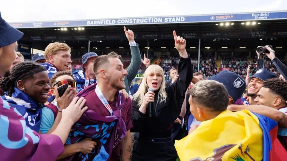 Pop star Natasha Bedingfield sang on the pitch after Burnley secured promotion

