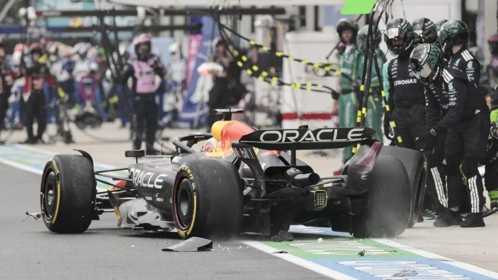 Norris Takes Sprint Win in Miami After Safety Car Shuffle 2 Debris falls off Norris Red Bull in the pit lane after he collided with Kimi Antonelli