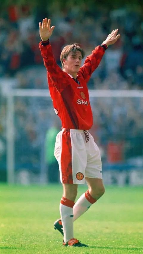 Beckham scored from the halfway line against Wimbledon in the last minute of the opening day of the 1996-97 season - perhaps his most famous goal and the one that launched his career

