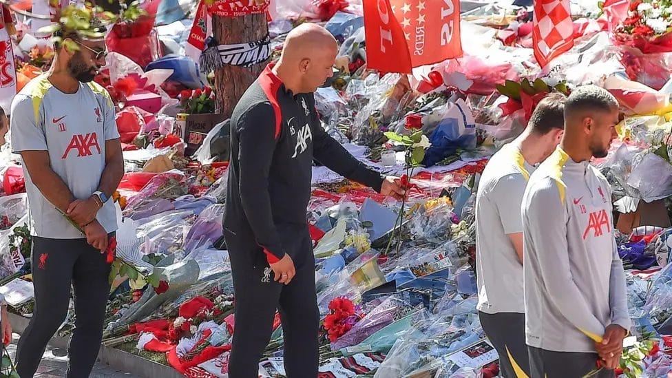 Liverpool manager Arne Slot and his players laid flowers for Jota and his brother Andre Silva at Anfield

